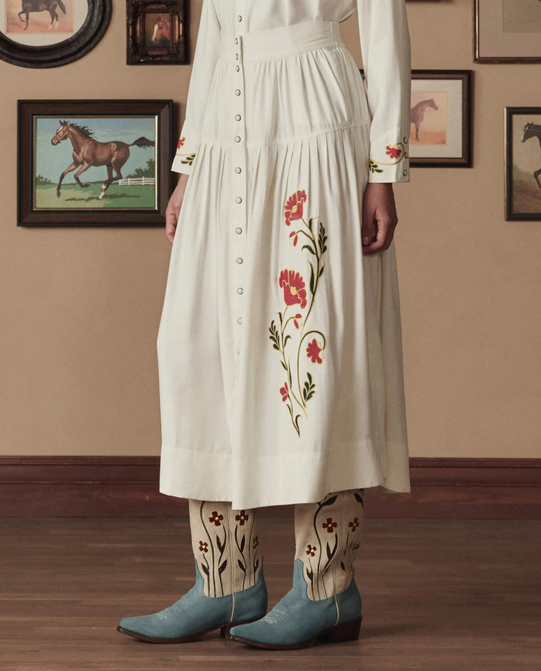 1285-the-western-embroidered-highland-skirt.-cream-with-chambray-mix-multi-emb-1.webp The Western Embroidered Highland Skirt. -- Cream With Chambray Mix Multi Emb