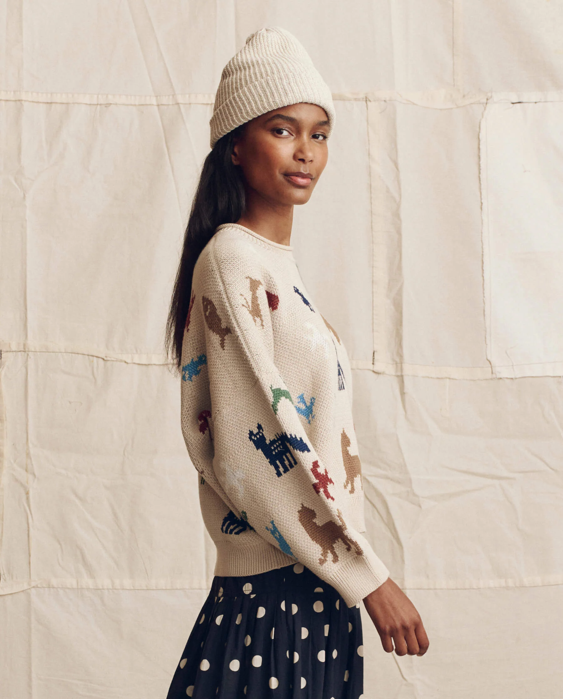 The Pictograph Roll Neck Pullover. -- Cream