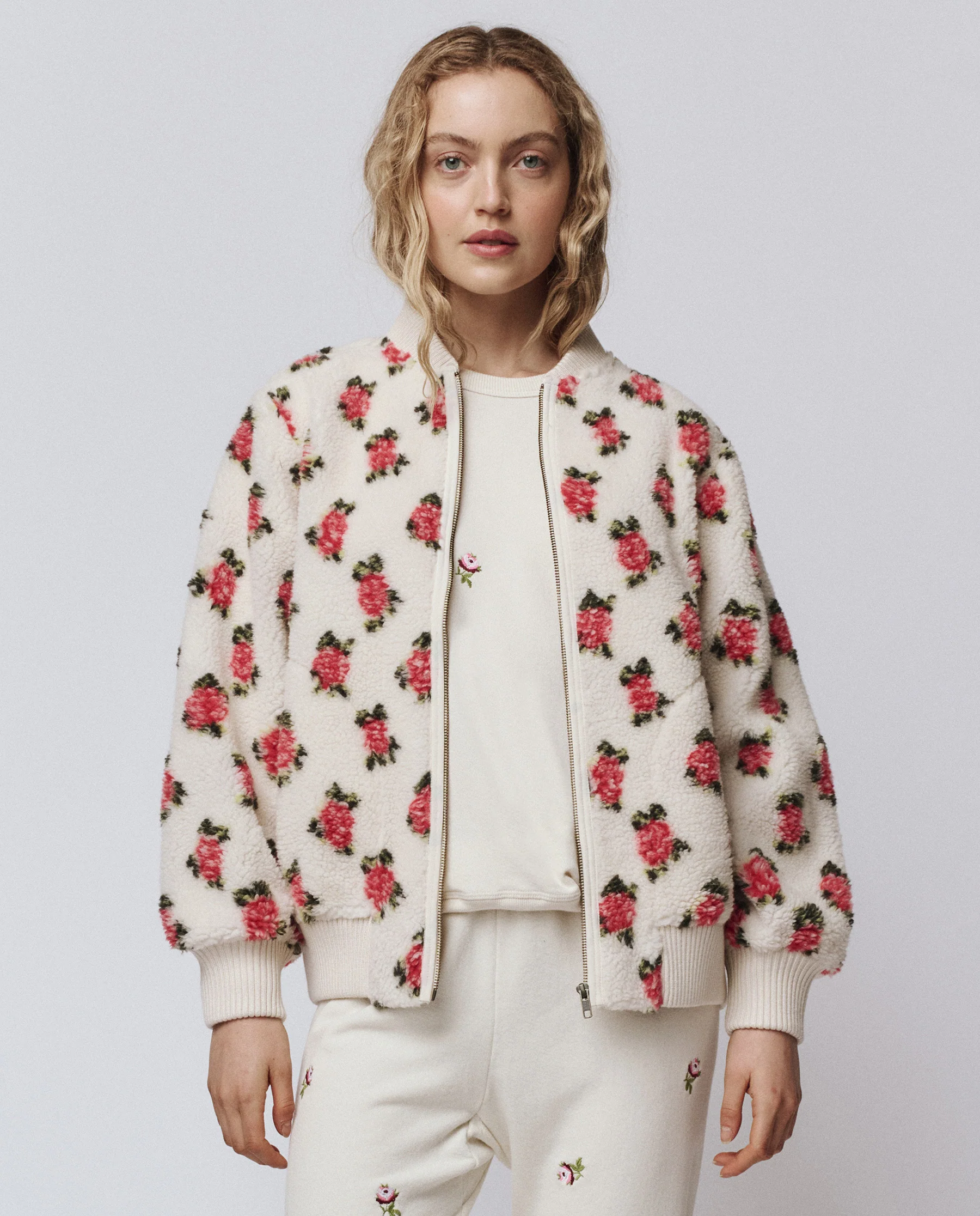 1826-the-zip-front-plush-bomber.-cream-rose-1.webp The Zip Front Plush Bomber. -- Cream Rose