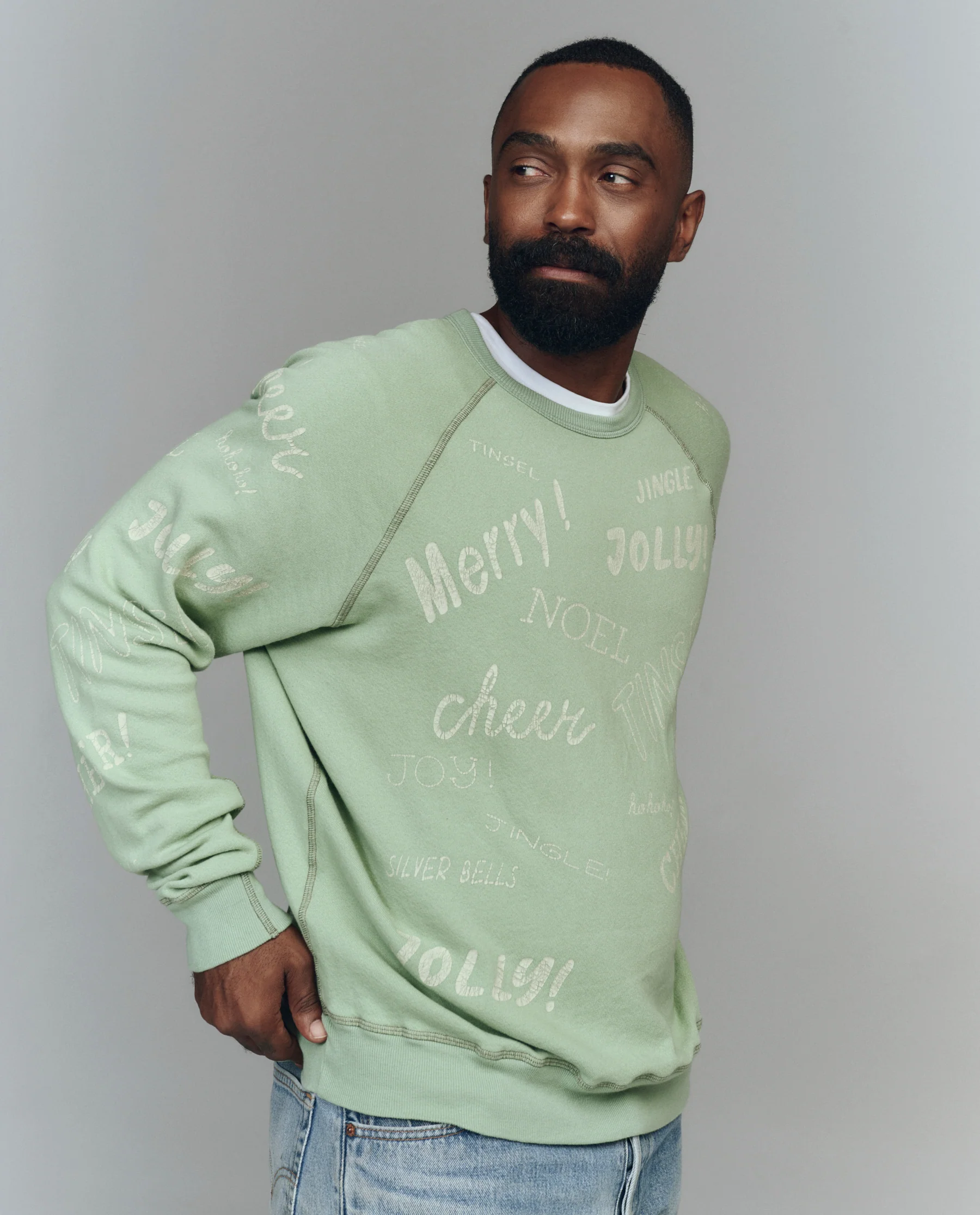 The Men's College Sweatshirt. Graphic -- Vintage Mint with Holiday Greetings Graphic