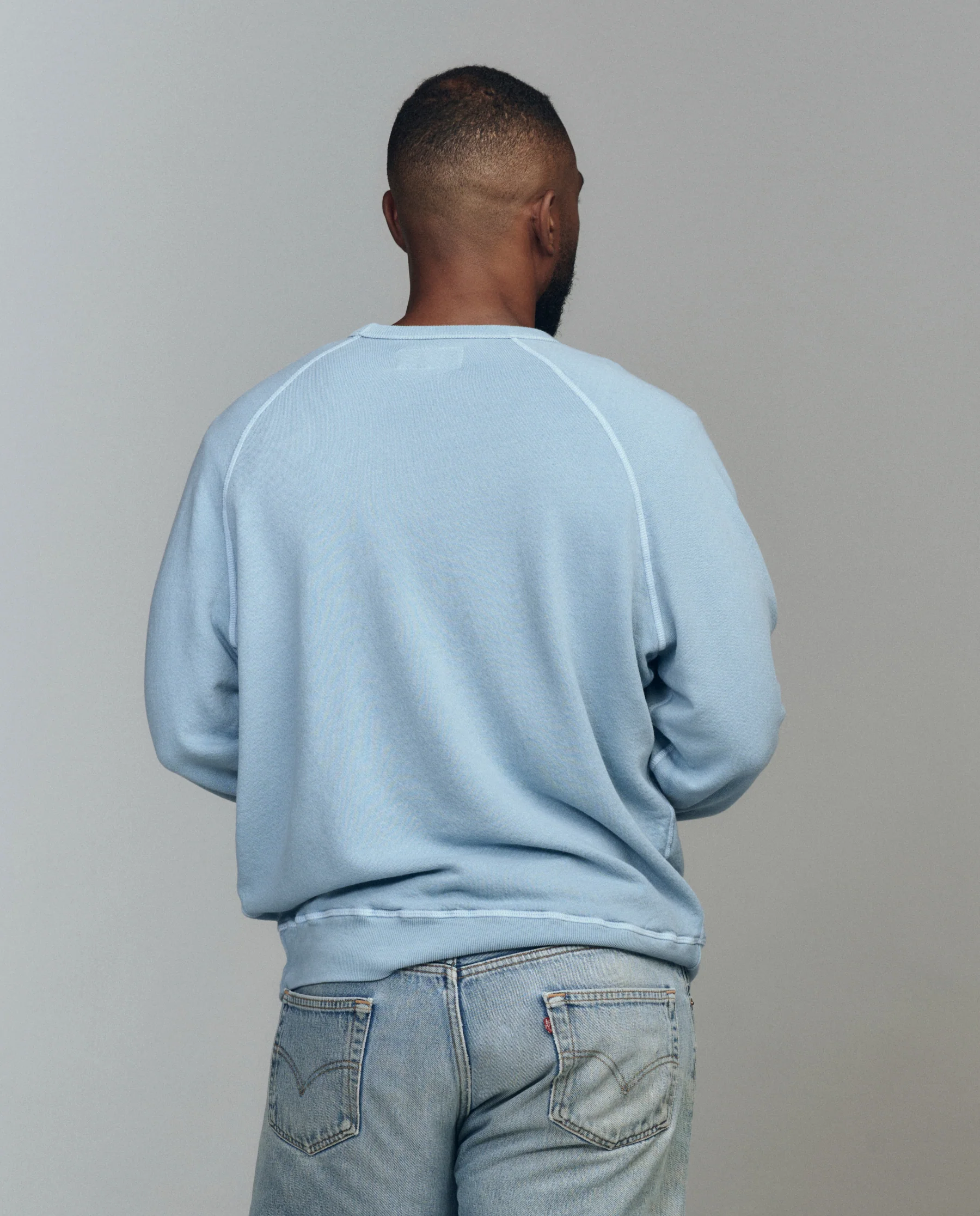 The Men's College Sweatshirt. Graphic -- Confection Blue with Happy Hannukah Graphic