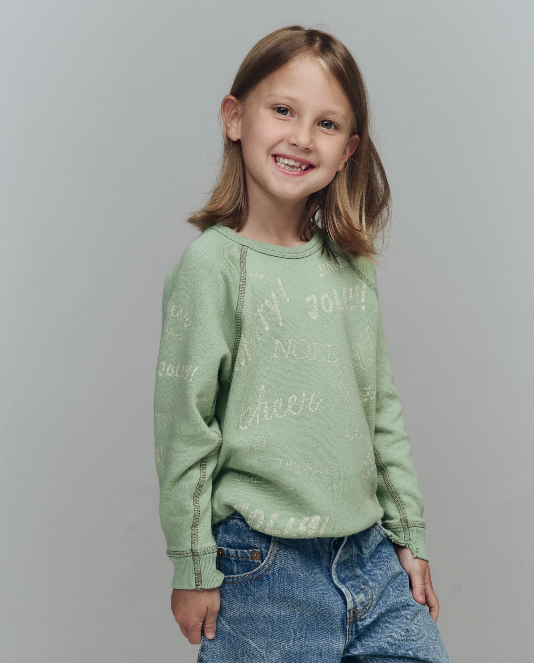 The Little College Sweatshirt. Graphic -- Vintage Mint with Holiday Greetings Graphic