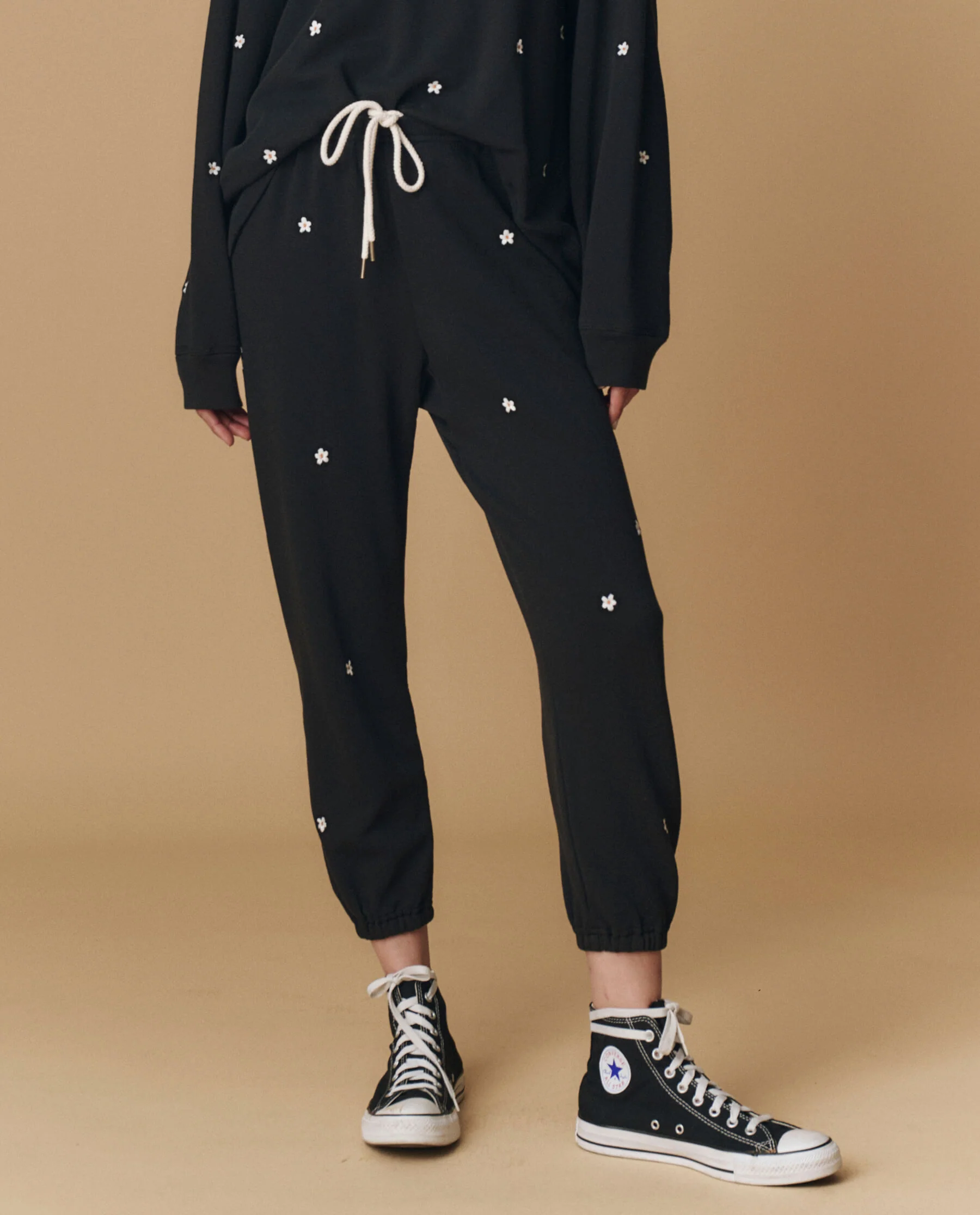 2291-the-stadium-sweatpant.-embroidered-almost-black-with-daisy-embroidery-1.webp The Stadium Sweatpant. Embroidered -- Almost Black With Daisy Embroidery