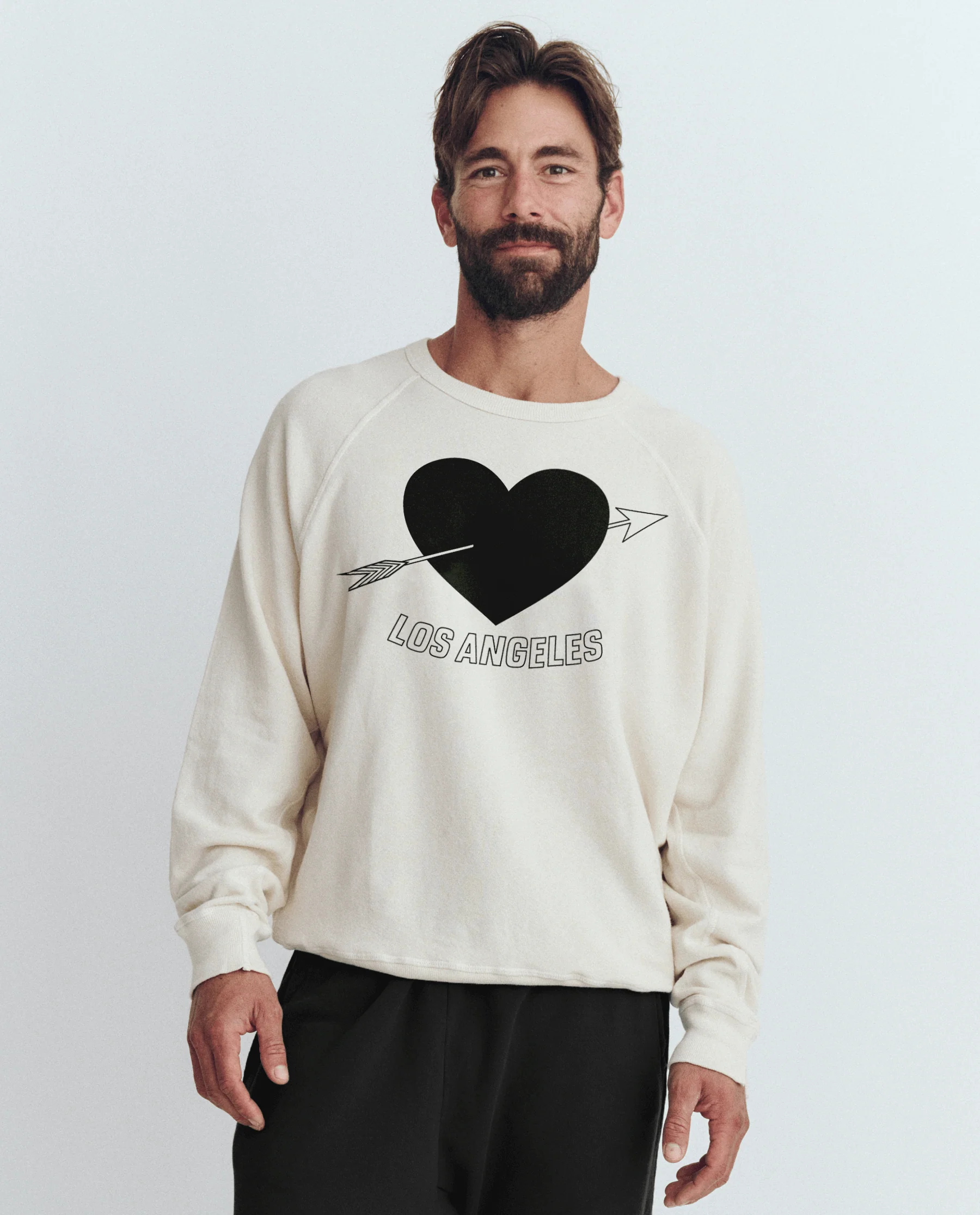 2591-the-men-s-college-sweatshirt.-graphic-washed-white-with-los-angeles-heart-graphic-1.webp The Men's College Sweatshirt. Graphic -- Washed White with Los Angeles Heart Graphic