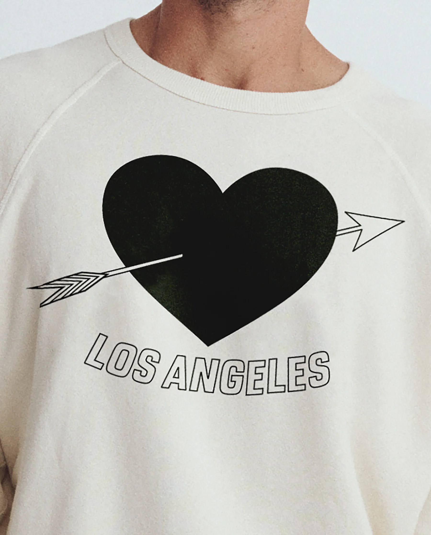 2591-the-men-s-college-sweatshirt.-graphic-washed-white-with-los-angeles-heart-graphic-2.webp The Men's College Sweatshirt. Graphic -- Washed White with Los Angeles Heart Graphic