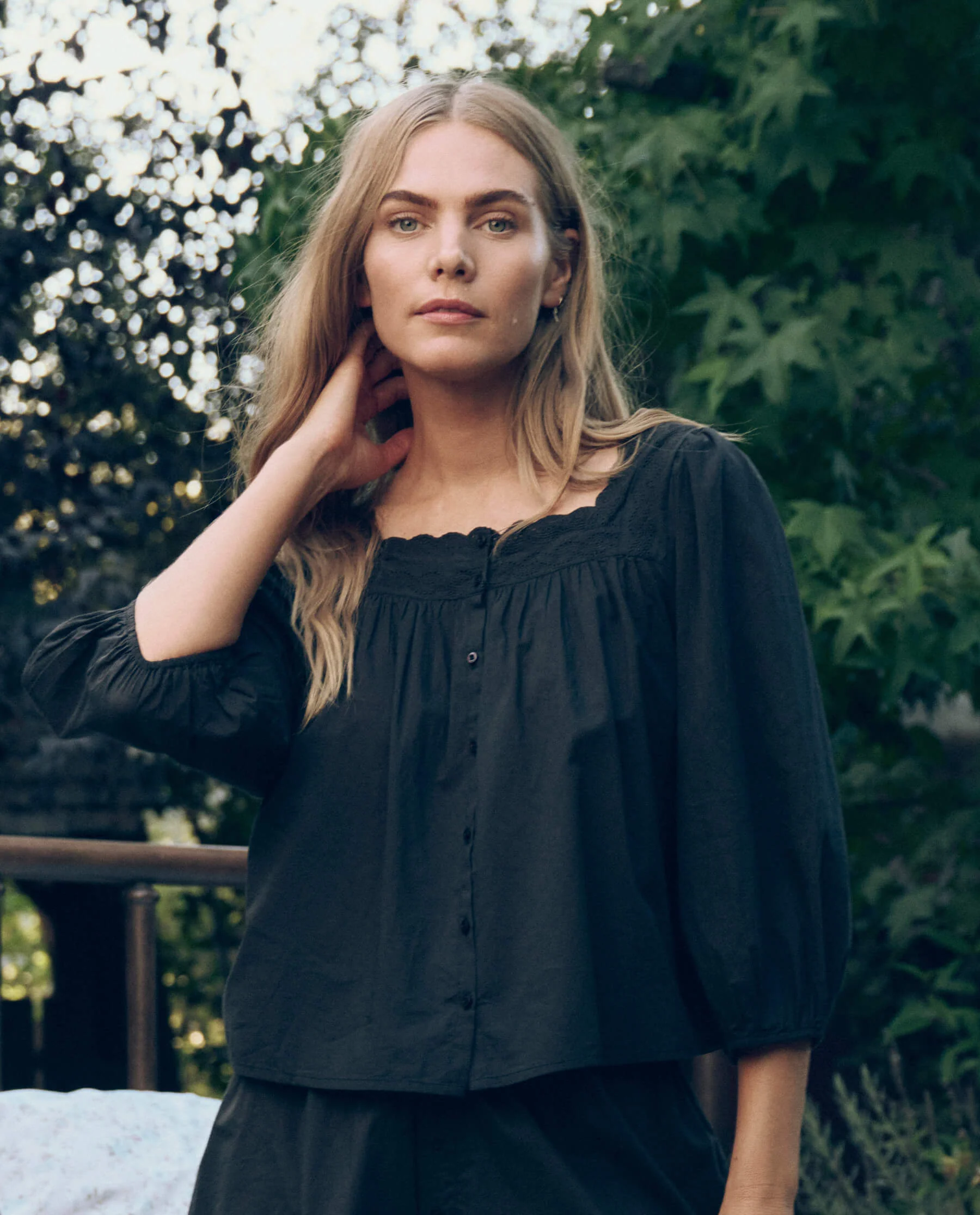 3149-the-eyelet-button-sleep-top.-black-1.webp The Eyelet Button Sleep Top. -- Black