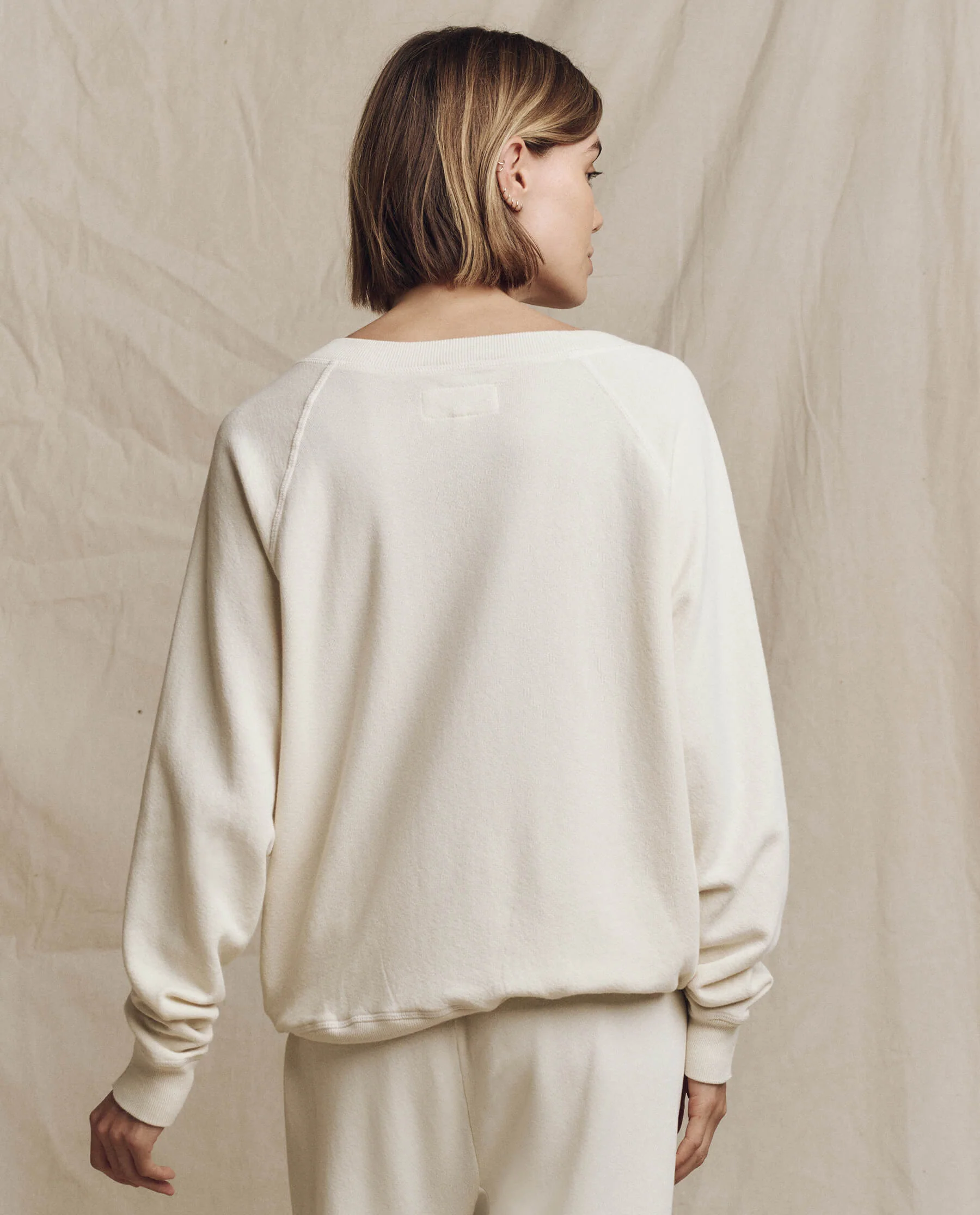 394-the-v-neck-sweatshirt.-washed-white-2.webp The V-Neck Sweatshirt. -- Washed White