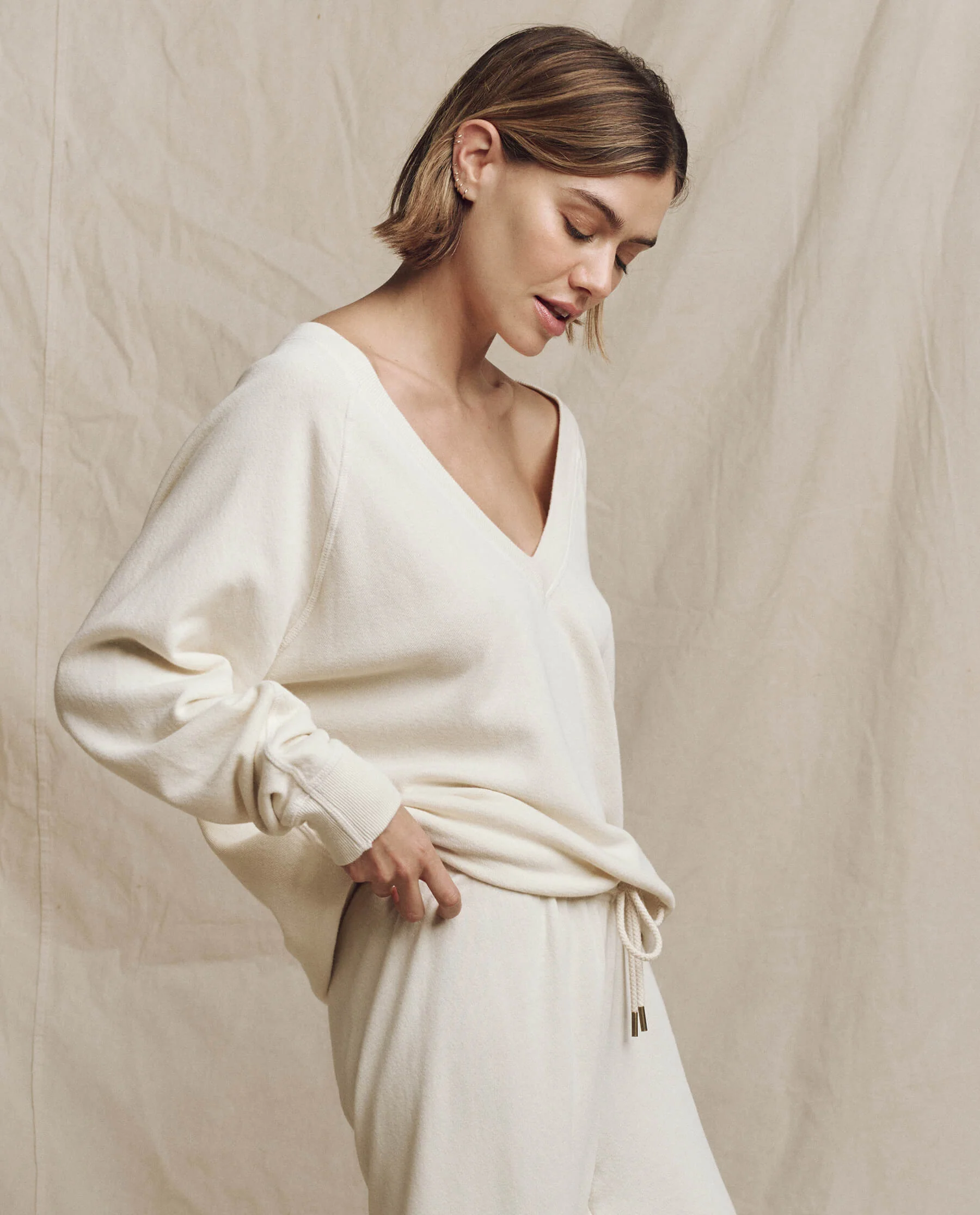 394-the-v-neck-sweatshirt.-washed-white-3.webp The V-Neck Sweatshirt. -- Washed White