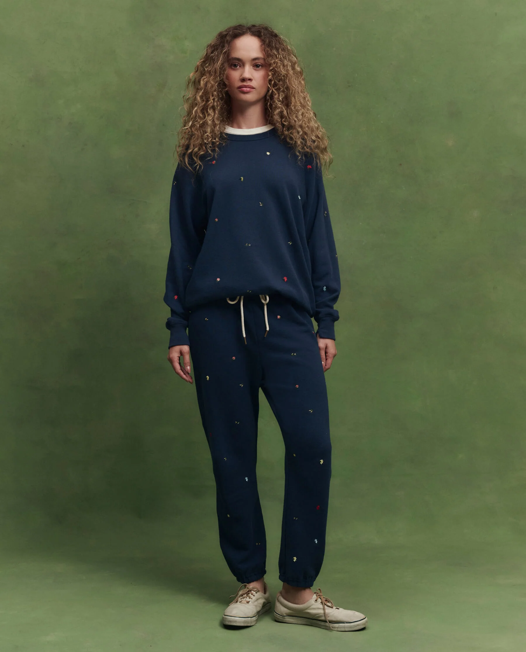 The College Sweatshirt w/ Tossed Floral Embroidery. -- Navy