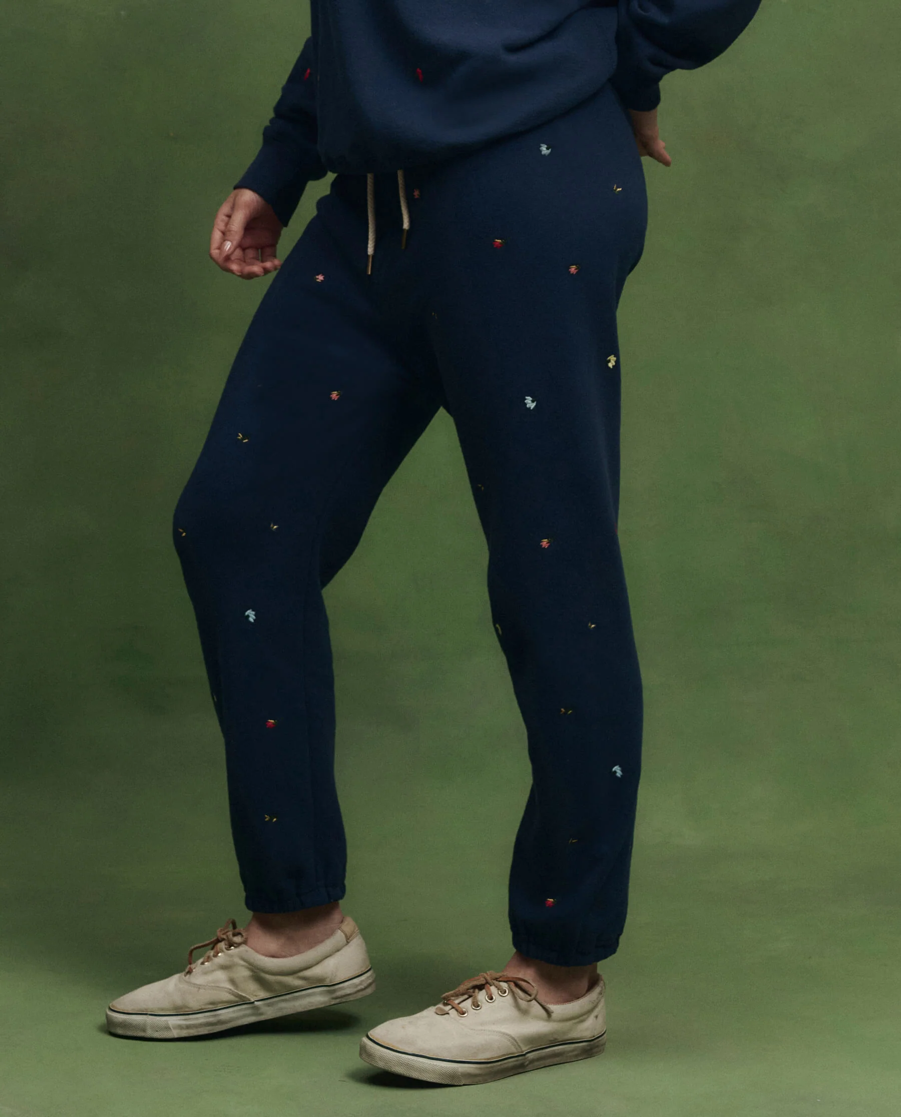 The Stadium Sweatpant w/ Tossed Floral Embroidery. -- Navy