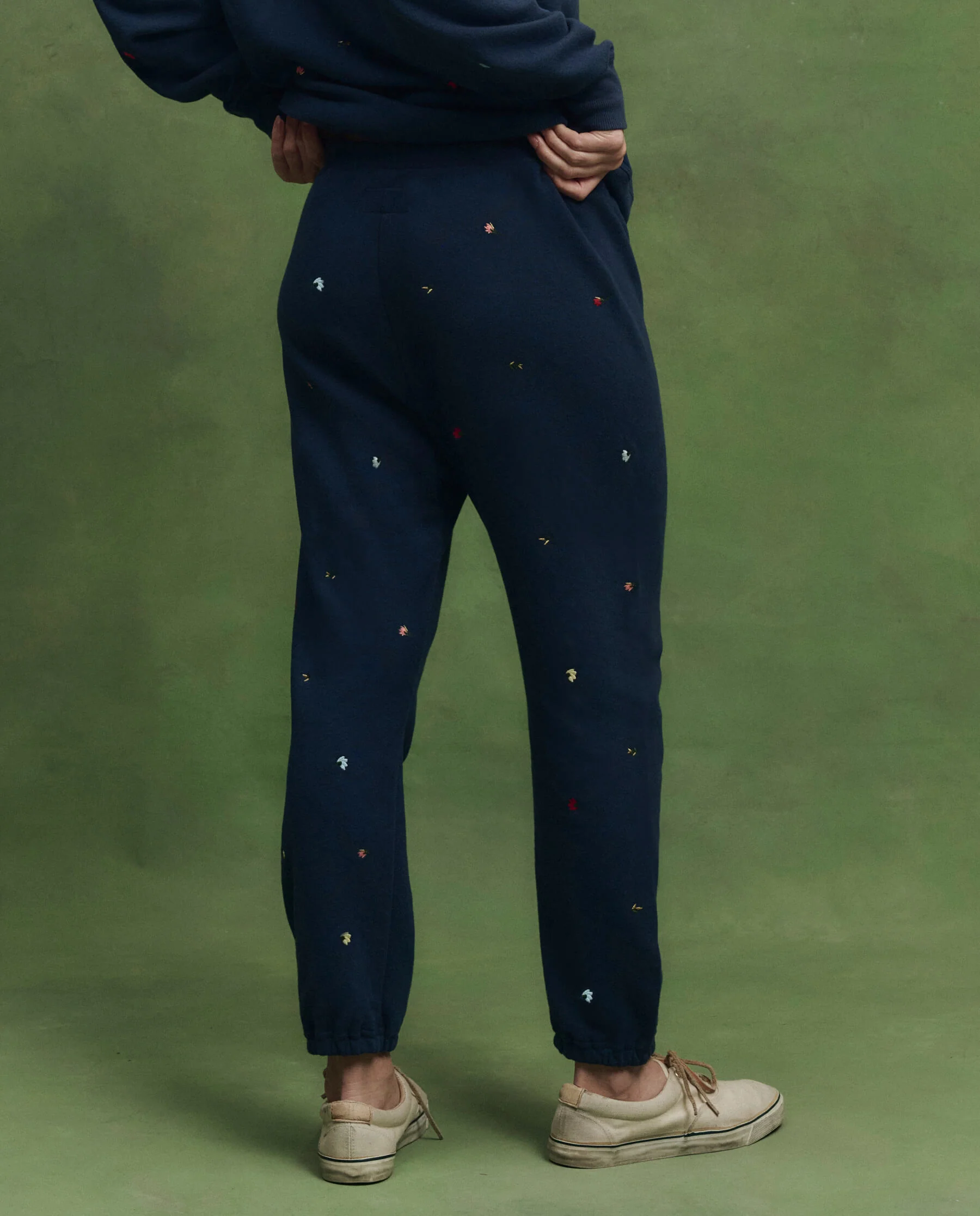 The Stadium Sweatpant w/ Tossed Floral Embroidery. -- Navy