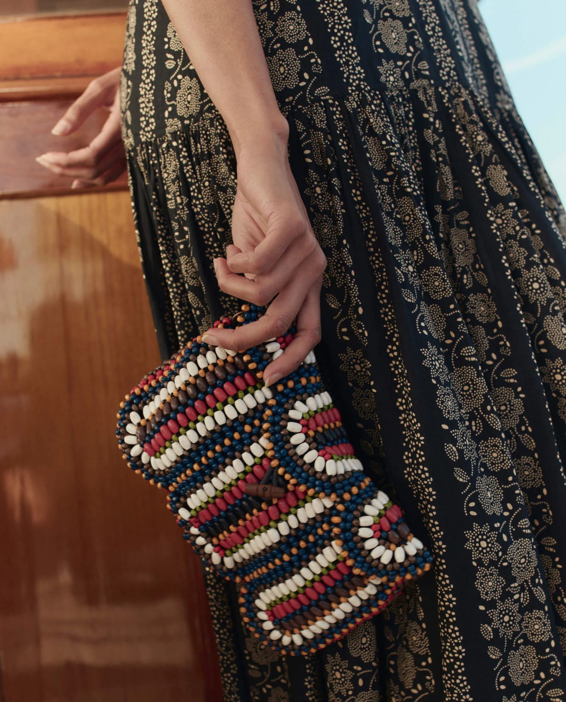 The Beaded Clutch. -- Cabana Stripe