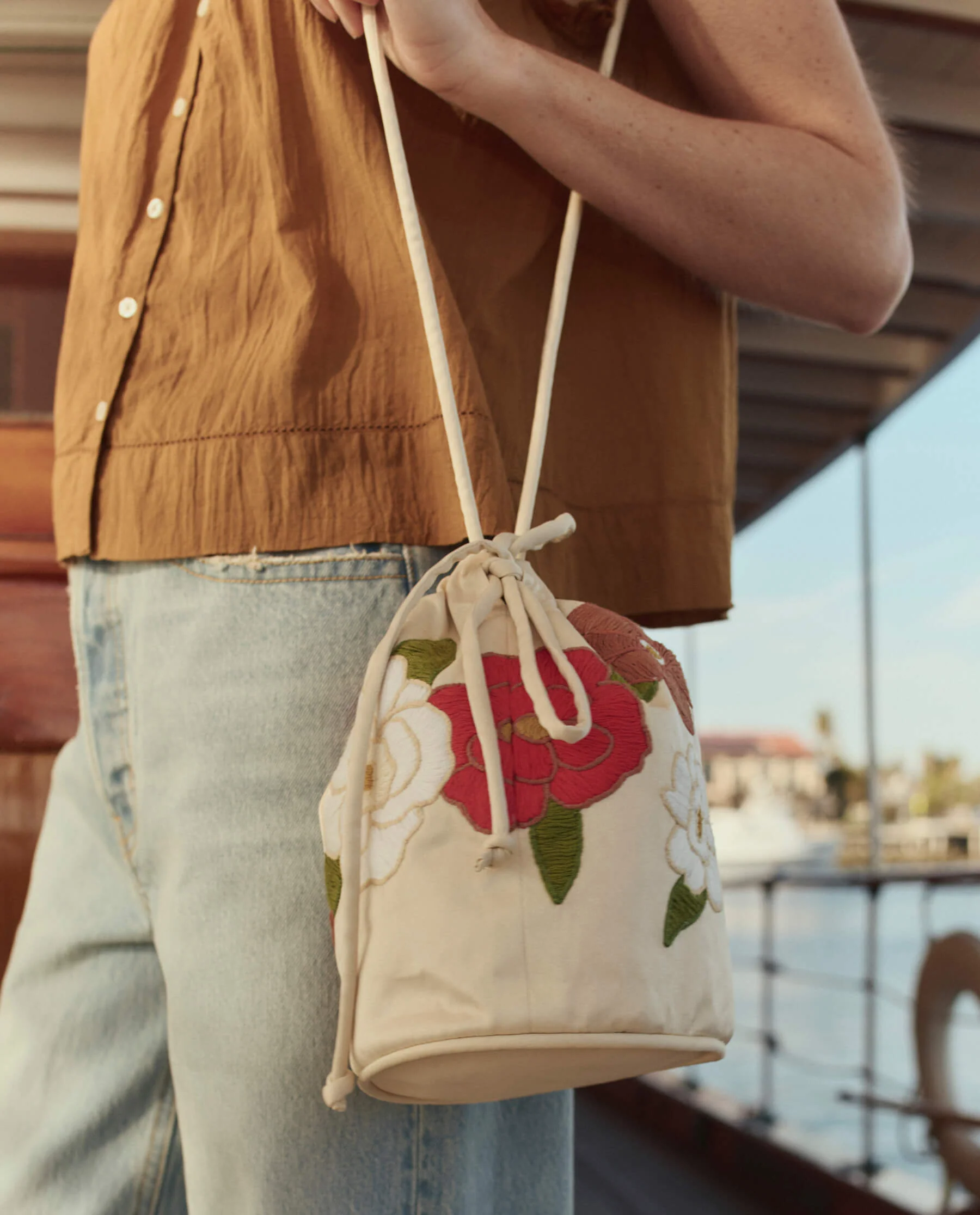 The Embroidered Cinched Bucket Bag. -- White