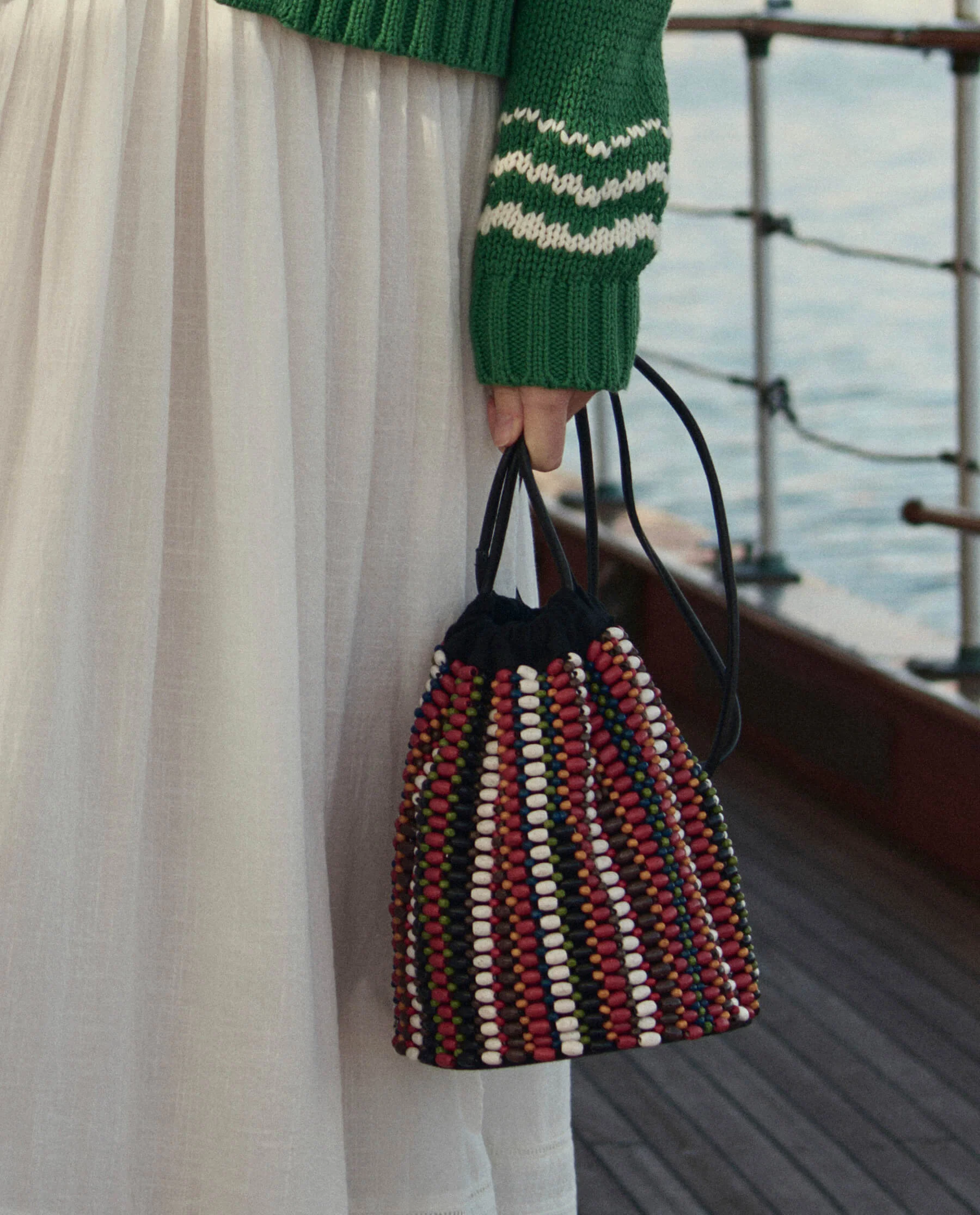 526-the-beaded-cinched-bucket-bag.-cabana-stripe-1.webp The Beaded Cinched Bucket Bag. -- Cabana Stripe