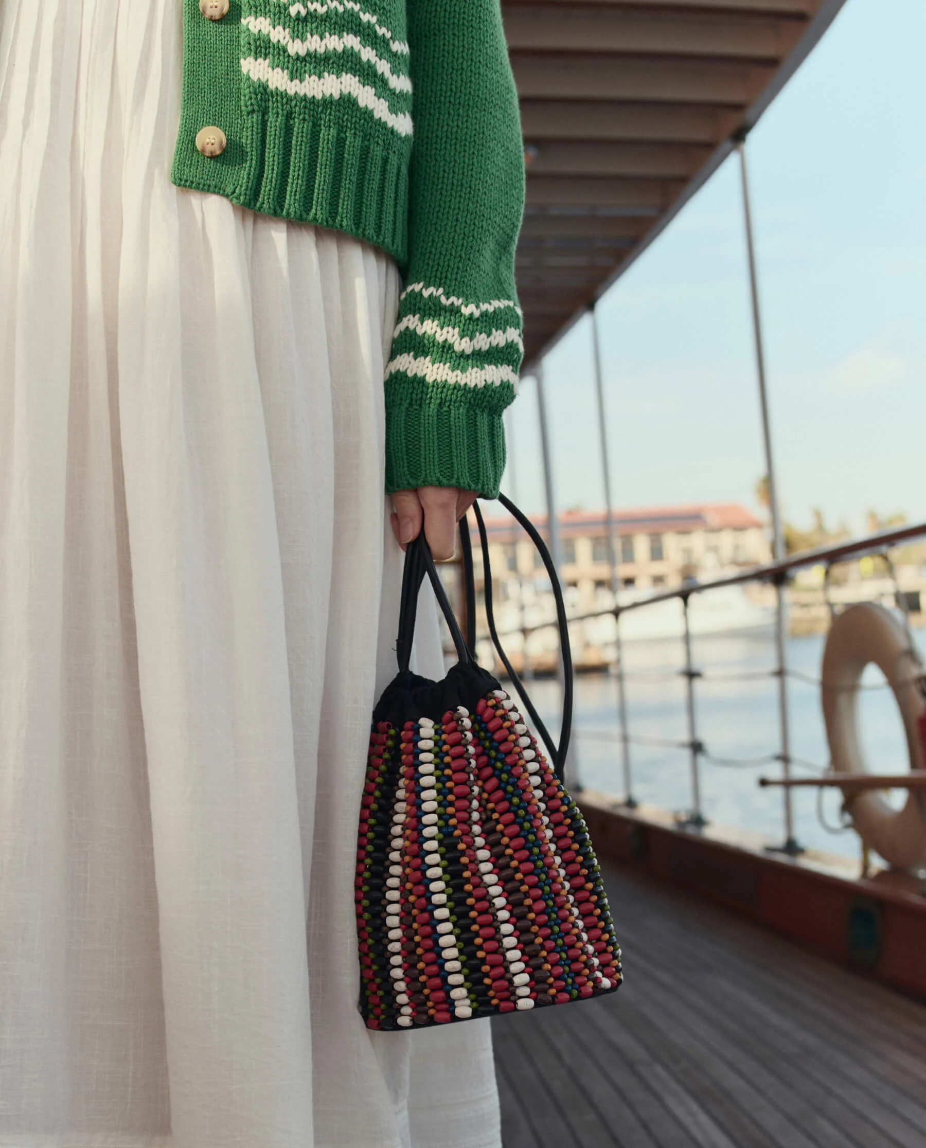 The Beaded Cinched Bucket Bag. -- Cabana Stripe