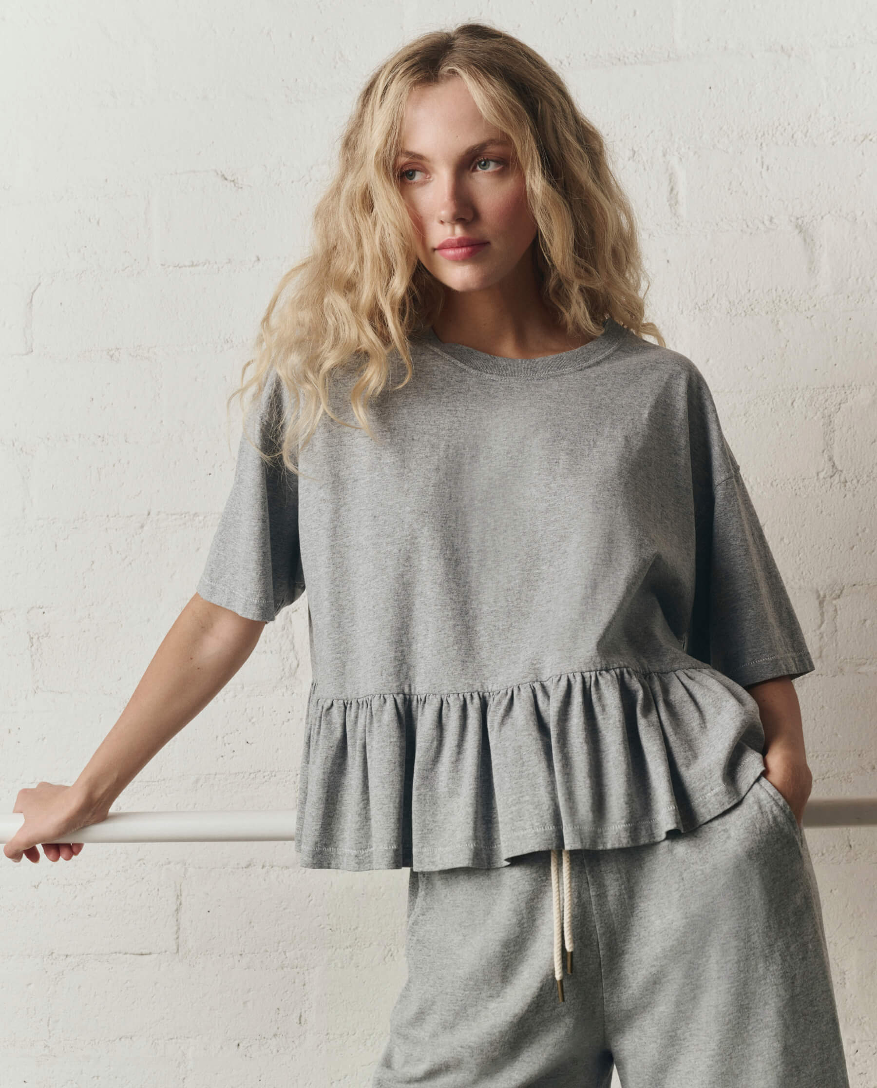 943-the-oversized-ruffle-peplum-tee.-heather-grey-2.jpg The Oversized Ruffle Peplum Tee. -- Heather Grey
