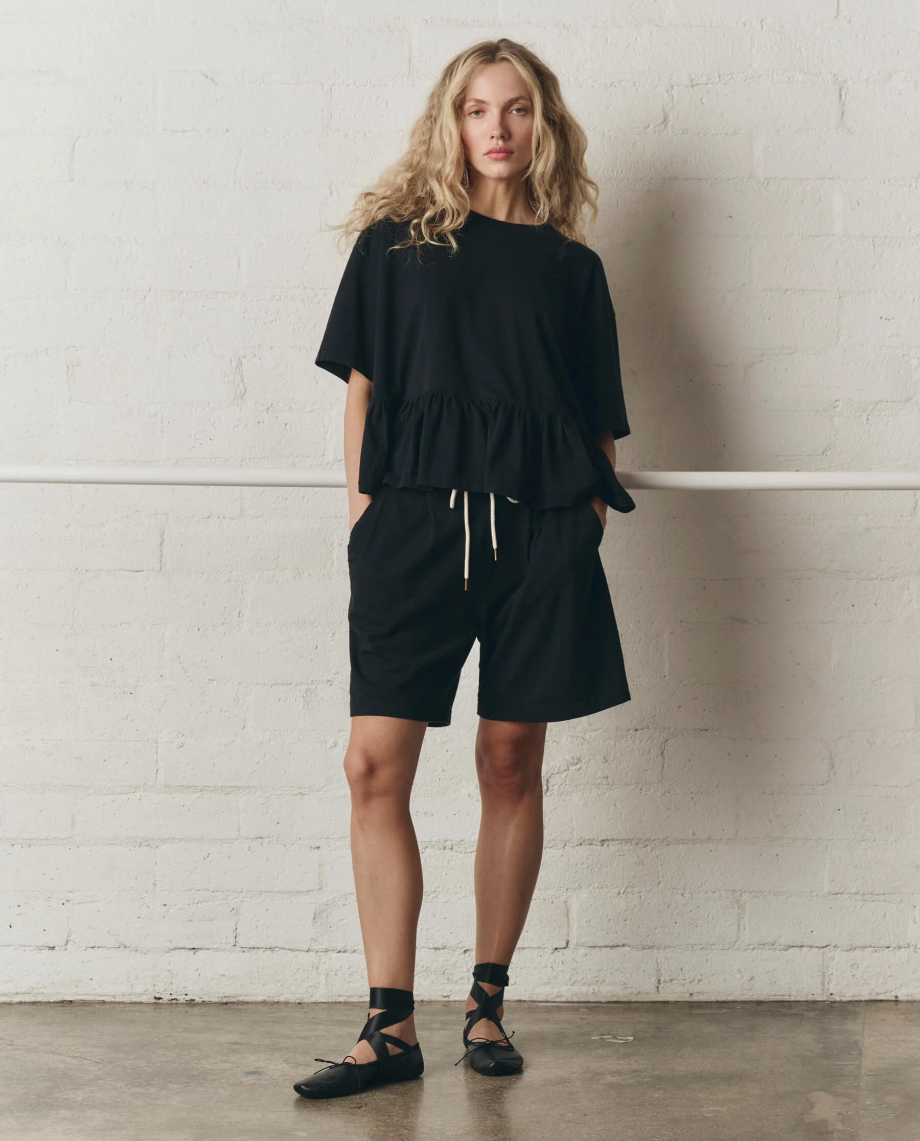 968-the-oversized-ruffle-peplum-tee.-true-black-5.webp The Oversized Ruffle Peplum Tee. -- True Black